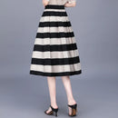 Conjunto Beleza Pura™: Saia com Listras Notáveis e Blusa Elegante!