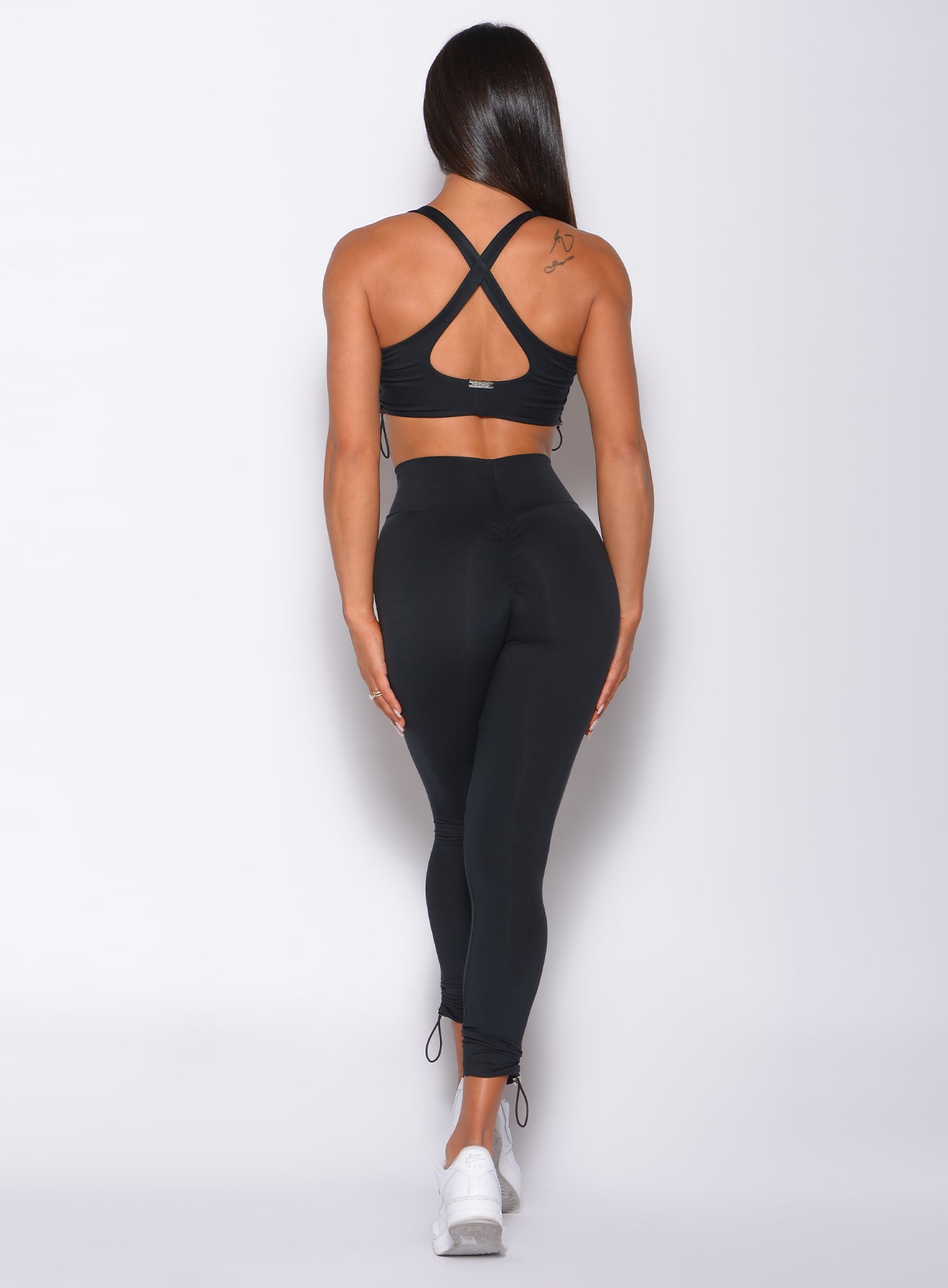Leggings con contorno y cierre ajustable